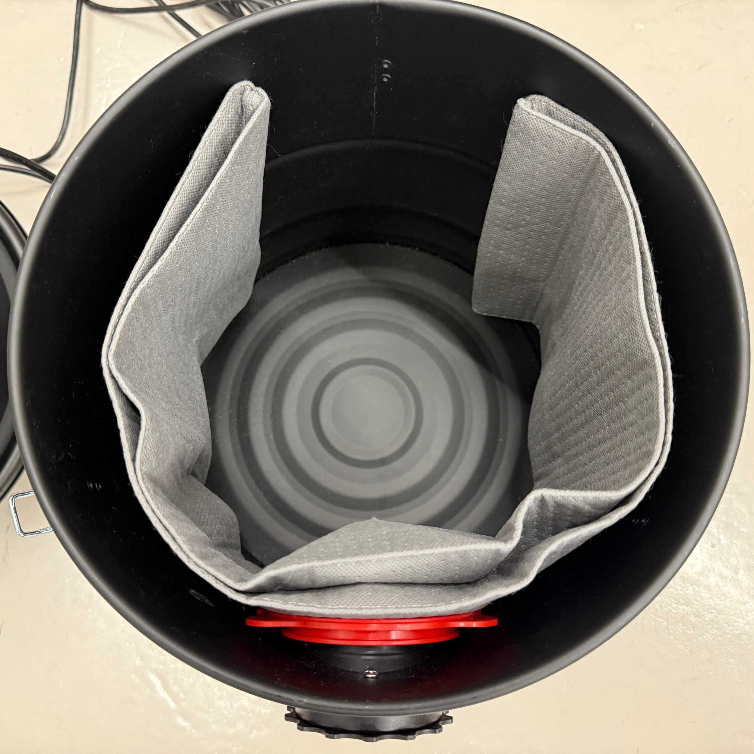 Reusable dust bag for Trend T32 emptied and shaken out for reuse