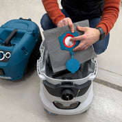 Close-up of the reusable dust bag fabric and collar for Makita VC4210